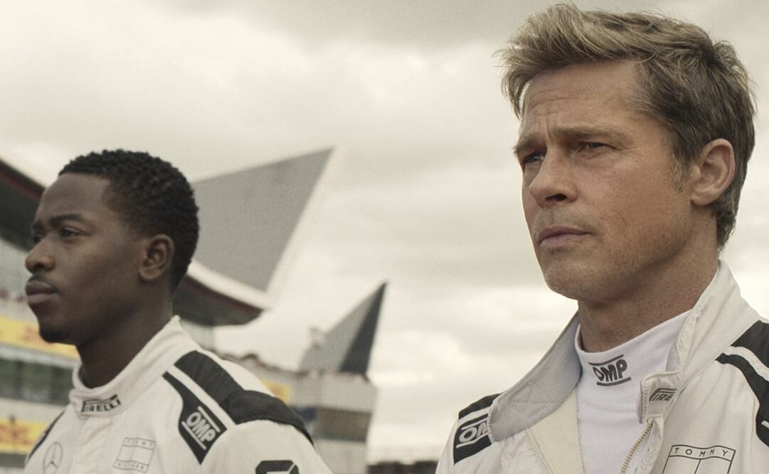 Damson Idris como Joshua Pearce, a la izquierda, y a Brad Pitt como Sonny Hayes en "F1: La Película". (Apple TV+ vía AP)