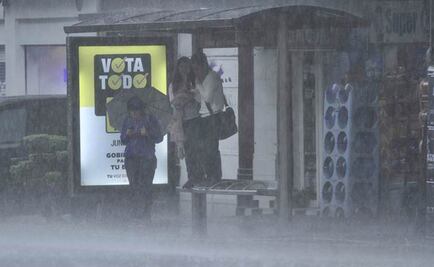 Rain falls over Mexico City