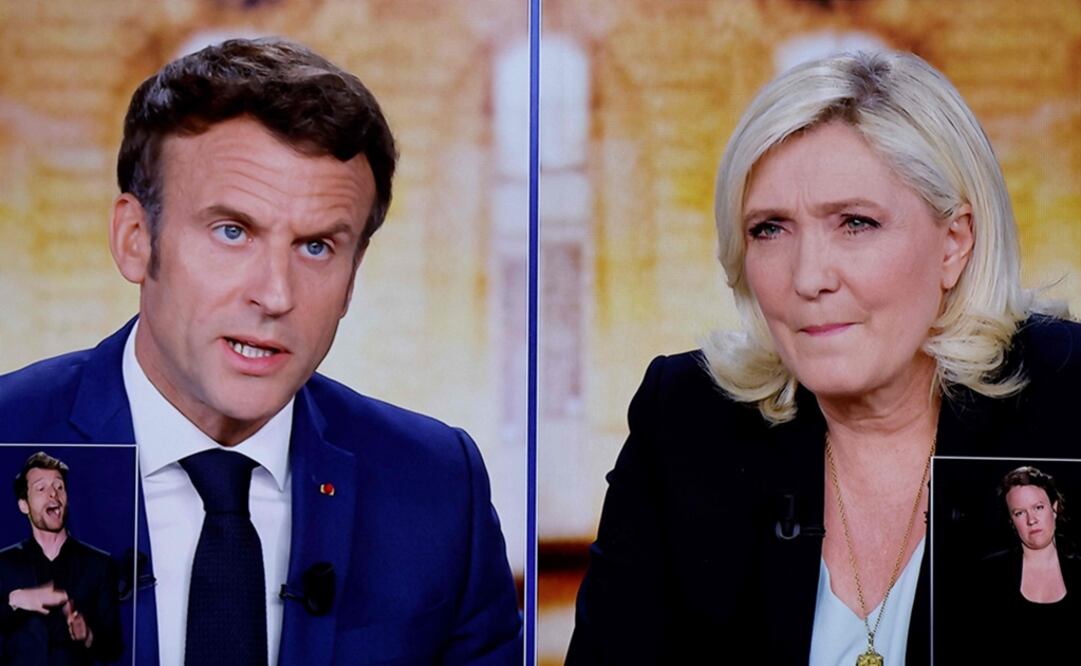 El presidente francés, Emmanuel Macron, y la candidata presidencial del partido de extrema derecha francés Rassemblement National (RN), Marine Le Pen. Foto: AFP