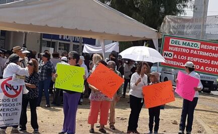 Vecinos de Satélite "clausuran" obra; acusan desaparición de tres calles