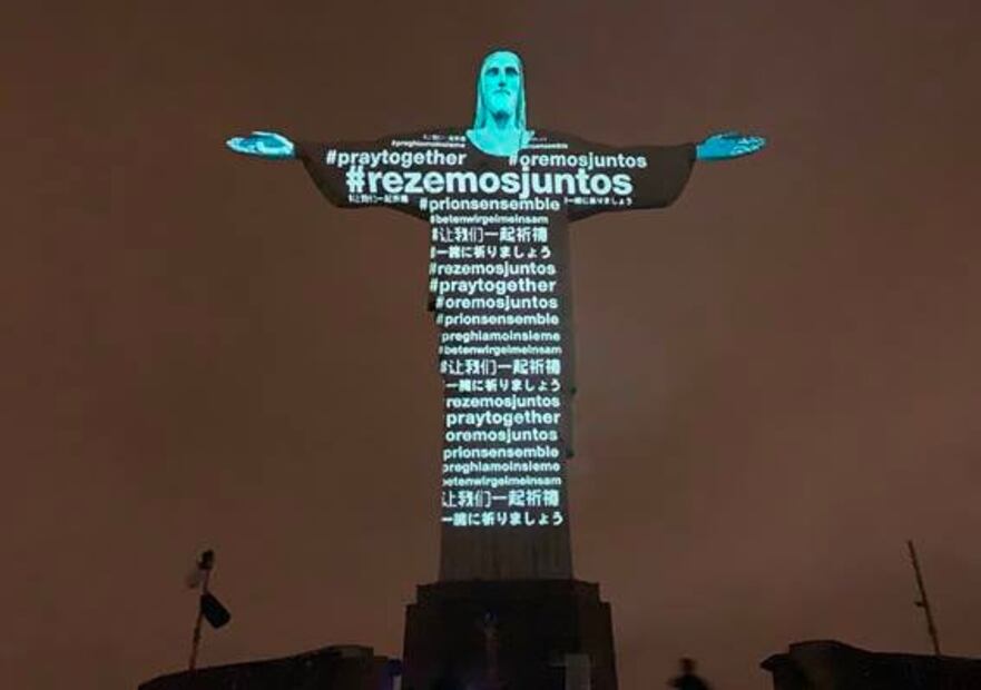 Cristo Redentor se ilumina con las banderas del mundo por coronavirus