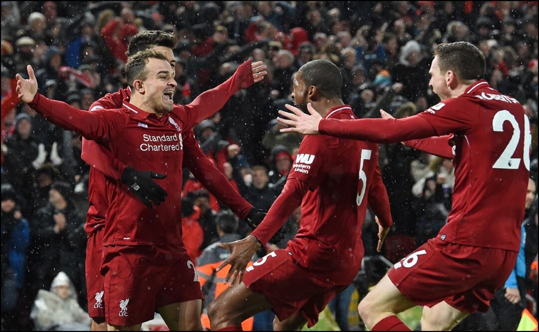 El suizo Xherdan Shaqiri celebra una de sus anotaciones en Anfield. Foto: AFP