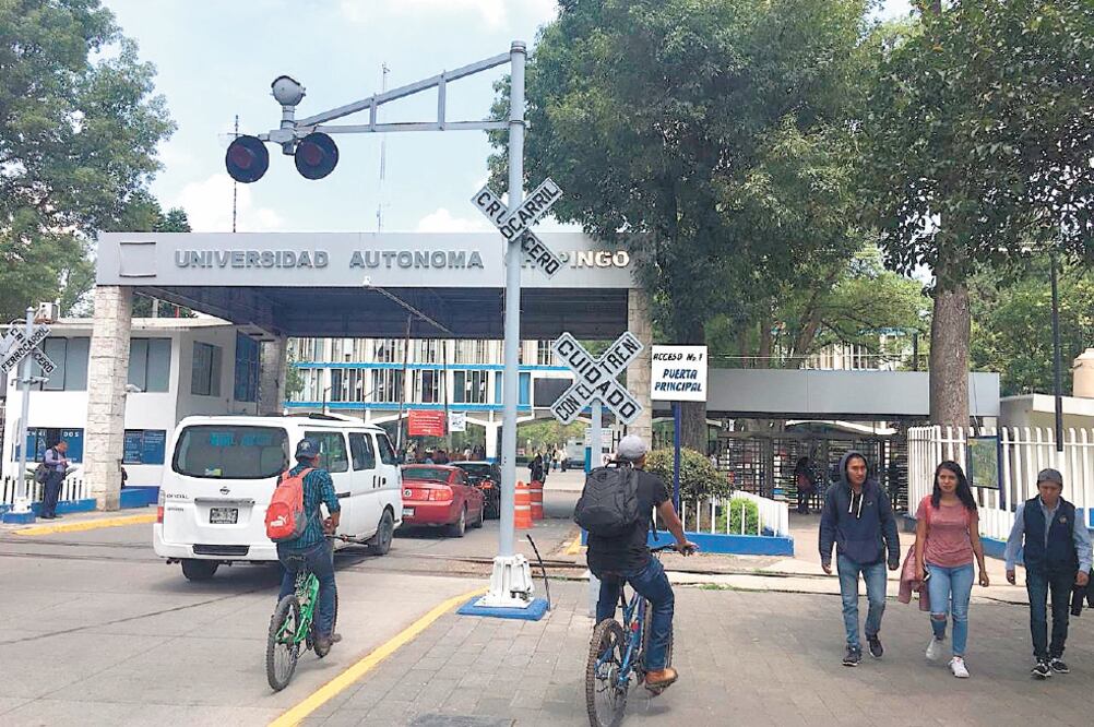 Rest ricc ión. La jornada electoral en la Universidad de Chapingo se realizó a puerta cerrada, sólo miembros de la comunidad ingresaron al campus. Foto: EMILIO FERNÁNDEZ. EL UNIVERSAL