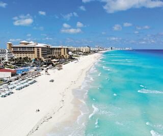 Pasa a semáforo amarillo Cancún, Tulum, Cozumel e Isla Mujeres