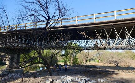 Intento de tumbar puente en caída de "El Mencho" fue un "escenario de guerra", cuentan habitantes; prevén demolición por daños