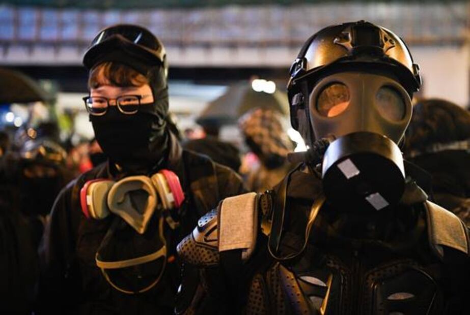 Protestas en Hong Kong cumplen seis meses; "marea negra" regresa a las calles