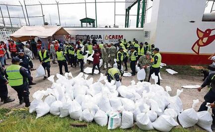 Trabajan para contener el desbordamiento de río en Lerma