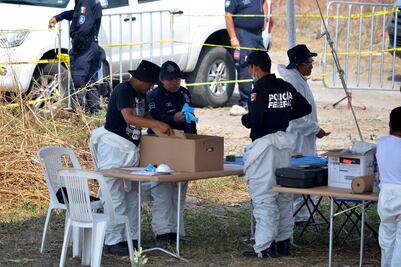 Suman 9 cuerpos recuperados de fosa en Tetelcingo