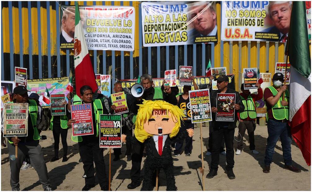 Manifestación de diversas organizaciones en defensa de migrantes en el muro que divide México y Estados Unidos de Norteamérica a la altura de playas de Tijuana a un día de que tome protesta como presidente Donald Trump. Foto: Diego Simón / EL UNIVERSAL
