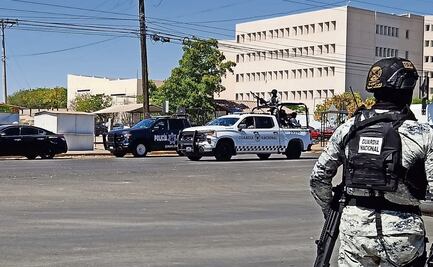 Reos armados se enfrentan a policías en penal de Culiacán 