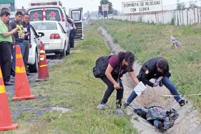 Encuentran cadáver de mujer en bolsa en Ecatepec