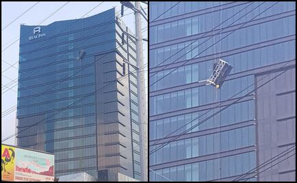 Trabajadores se salvan de caer desde un piso 24 en Nuevo León