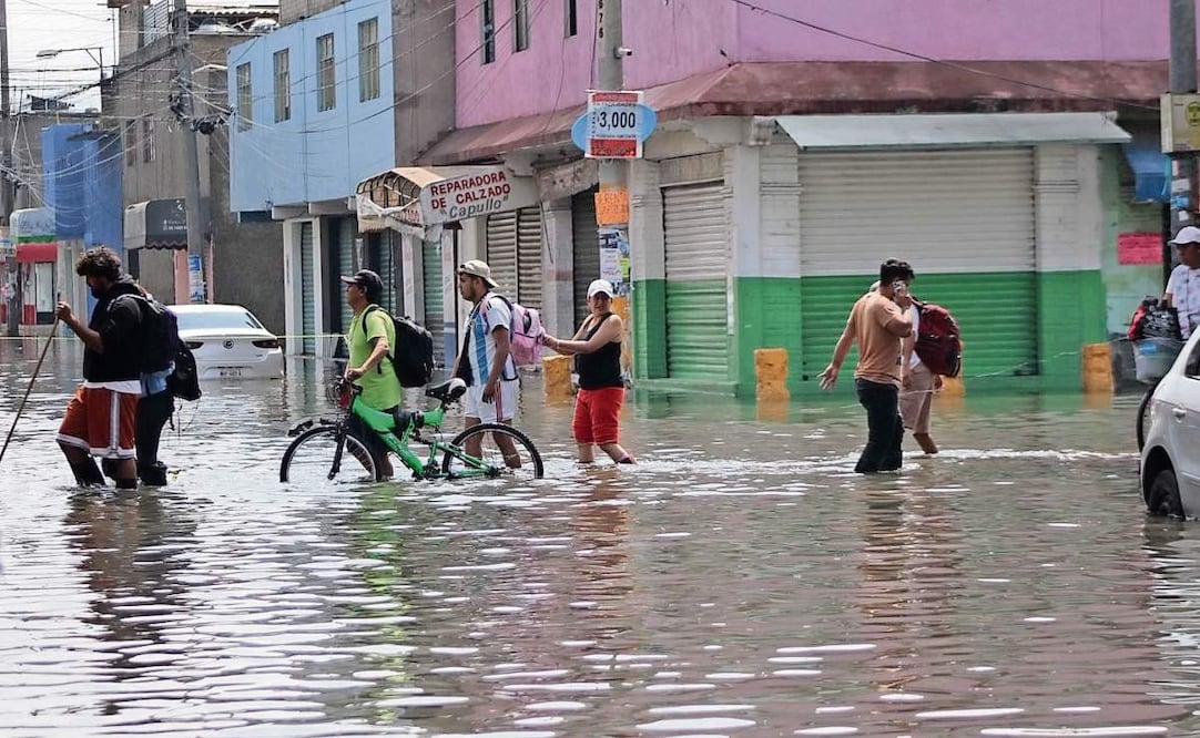 En tres horas cayó el equivalente a un mes de agua en Neza, por lo que 14 colonias se anegaron. Foto: Emilio Fernández / EL UNIVERSAL