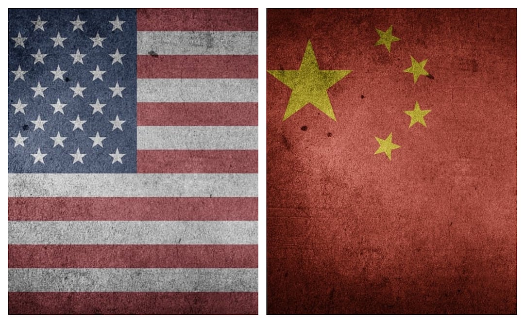 Banderas de Estados Unidos (EU) y China. Foto: Especial