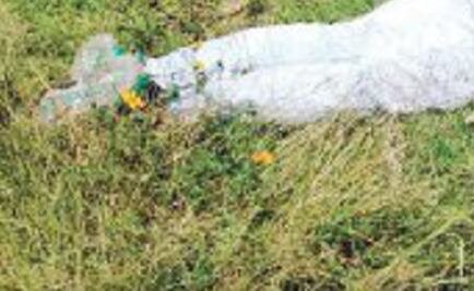 Abandonan cadáver de mujer en terreno baldío de Texcoco; el cuerpo tenía impactos de bala