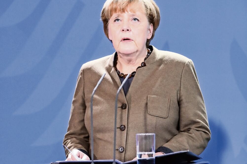 Merkel en una conferencia de prensa el 23 de diciembre. (SHAN YUQI.XINHUA)