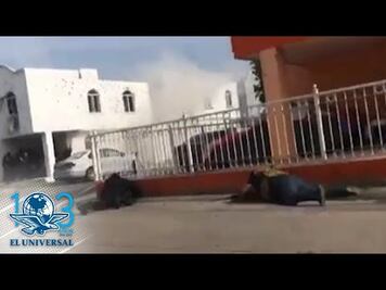 Momento del enfrentamiento entre civiles armados y policías en Tlajomulco