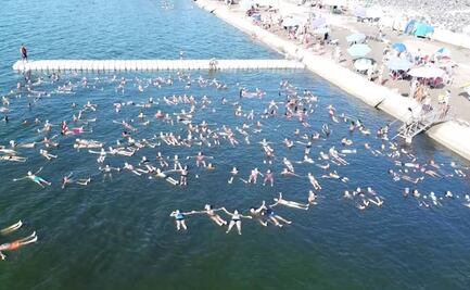 VIDEO: Cientos de personas flotando en laguna de Argentina, ¿por qué?; así fue el “festival de la planchita"
