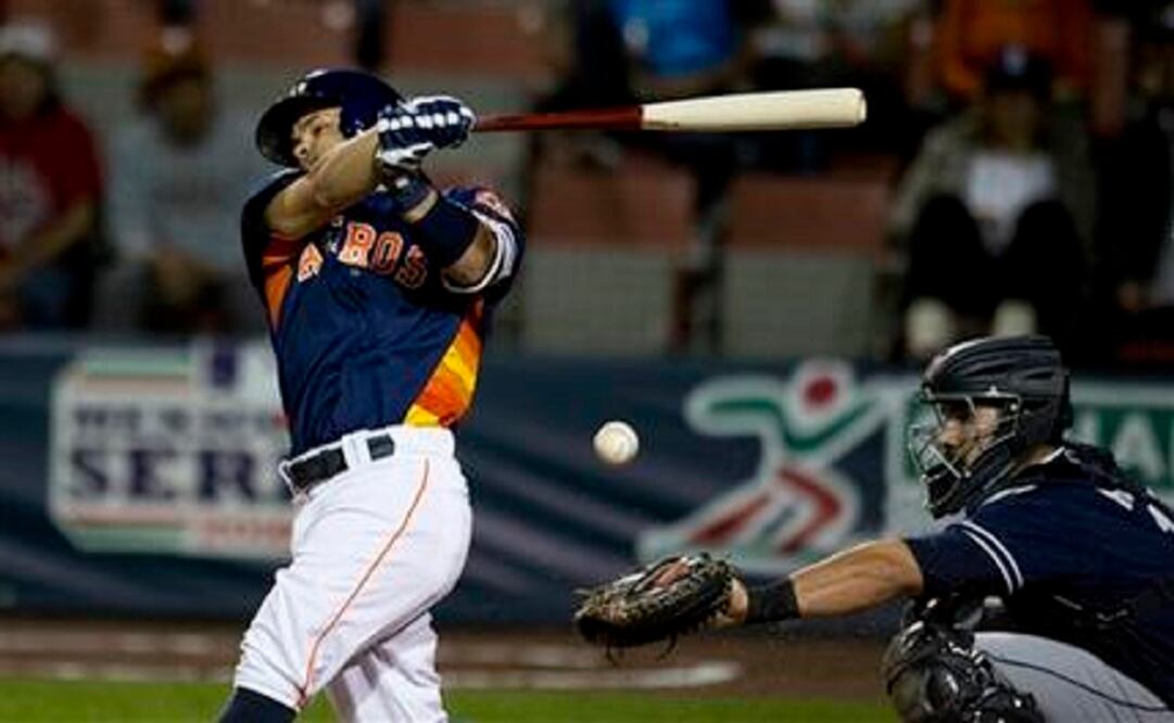 Houston Astros' Jose Altuve bats against the San Diego Padres in a spring training baseball game in Mexico City. (Photo: AP)