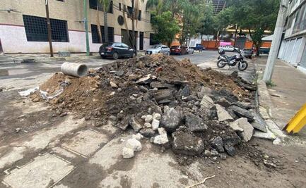Vecinos de Benito Juárez denuncian que reparación de fuga en Eje 6 Sur no concluyó de forma adecuada; se quejan de escombros y baches