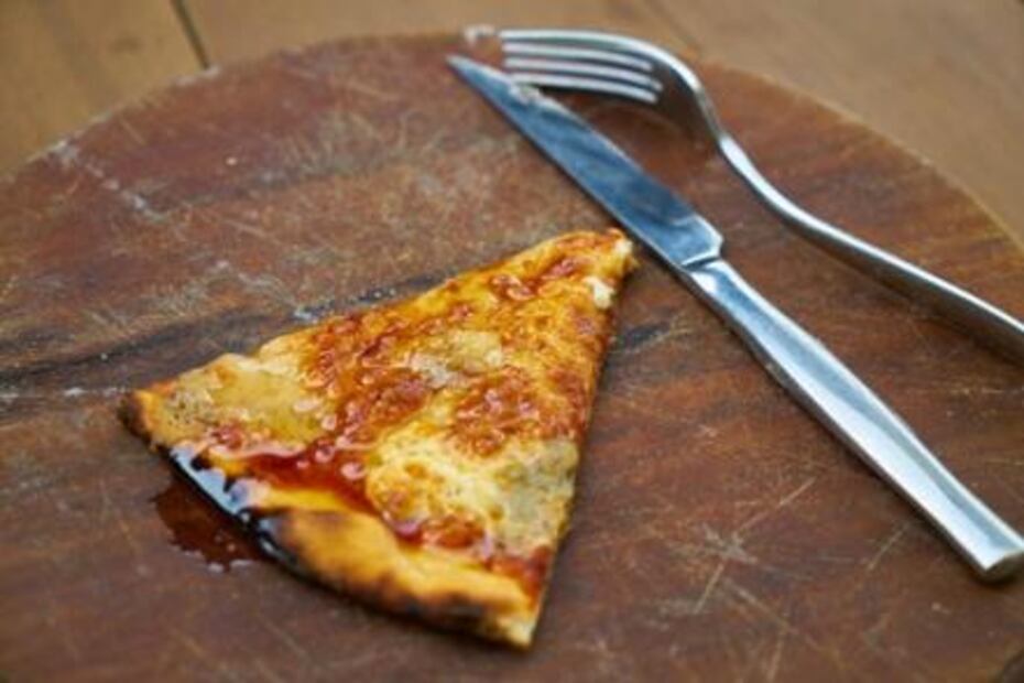 7 razones por las que es dañino comer pizza