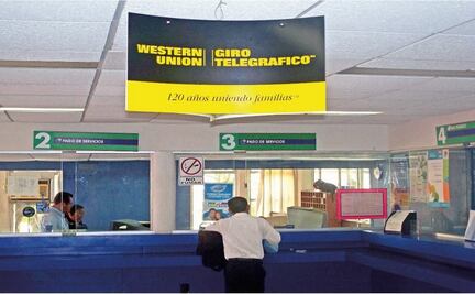 Migrants in U.S., Mexico fret about Trump threat to halt remittances