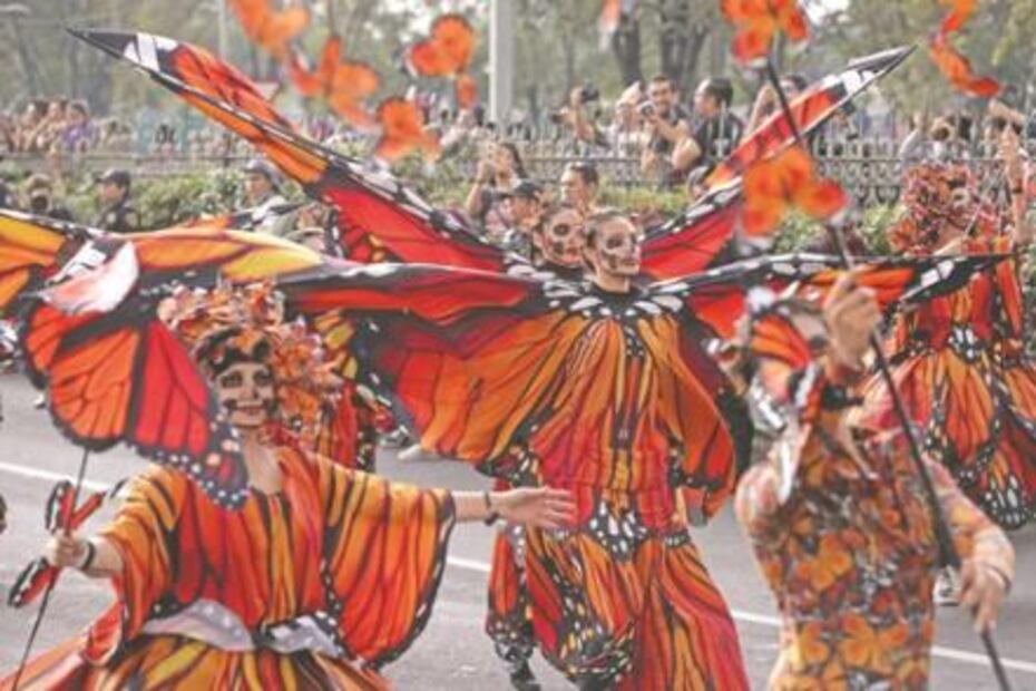 Lluvia no resta ánimo a desfile de catrinas