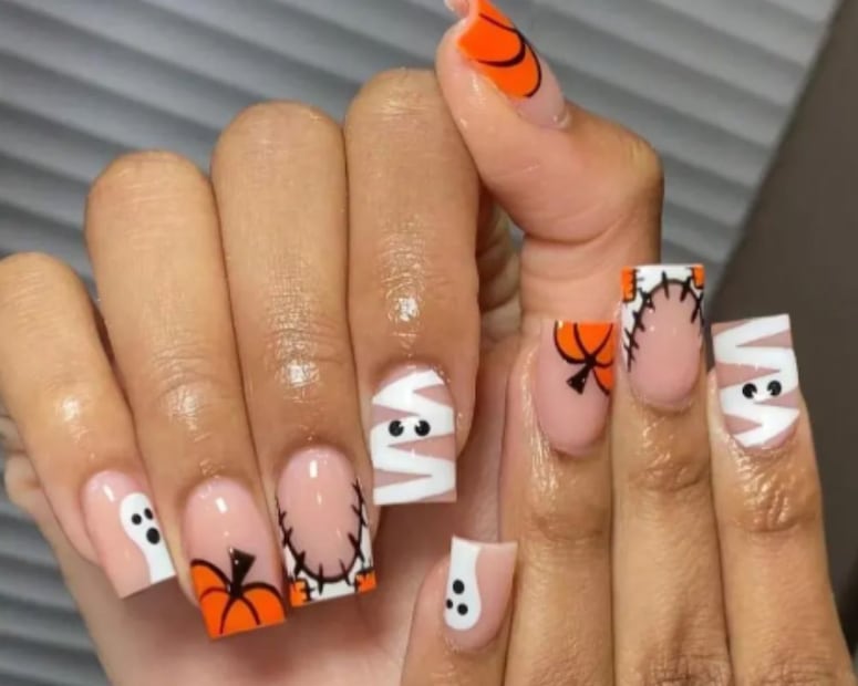 En este diseño de uñas puedes agregar detalles de temporada como calabazas, fantasmas o arañas. Foto: Etsy