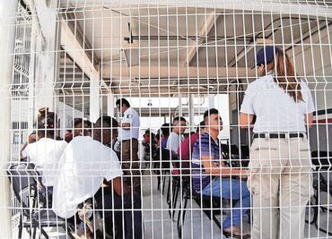 One dead and 10 wounded after riot inside immigration detention center in Mexico