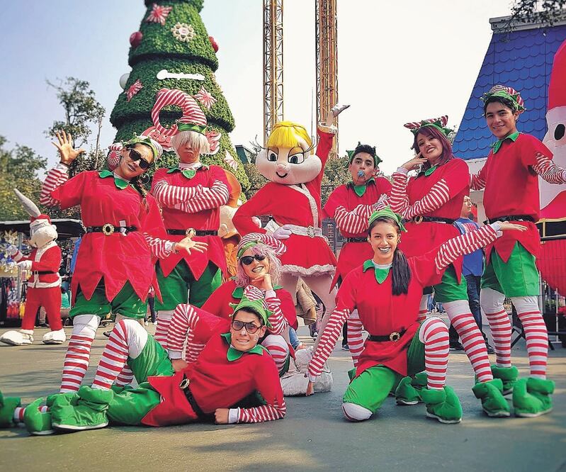 Los hermanos celebran Navidad en un parque de diversiones. Foto: CORTESÍA