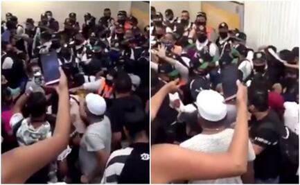 Sin sana distancia, ambulantes y policías riñen en Metro Pino Suárez