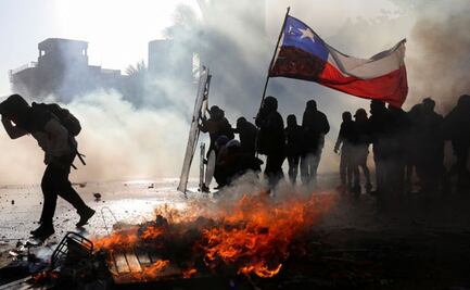 Durante protestas, manifestantes roban más de 200 mil dólares en banco de Chile 