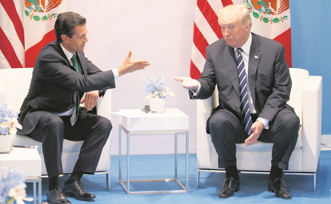 El presidente de México, Enrique Peña Nieto, con su par de Estados Unidos, Donald Trump, en la cumbre del G20, en julio de 2017, en Alemania. (ARCHIVO AP)