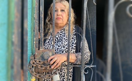 VIDEO "Primero me sacan de aquí muerta"; mujer se encierra con candado tras invasión de su vivienda en Sonora