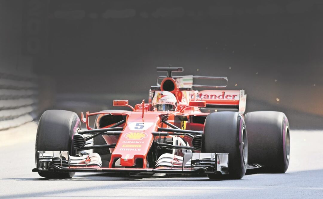 El bólido de Ferrari hizo ver mal a los Mercedes. (PASCAL GUYOT. AFP)