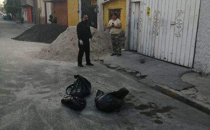Hallan tres bolsas con restos humanos en Neza