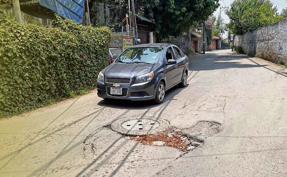 Caer en un bache puede dañar la suspensión de tu auto. Foto: Fernanda Rojas / EL UNIVERSAL