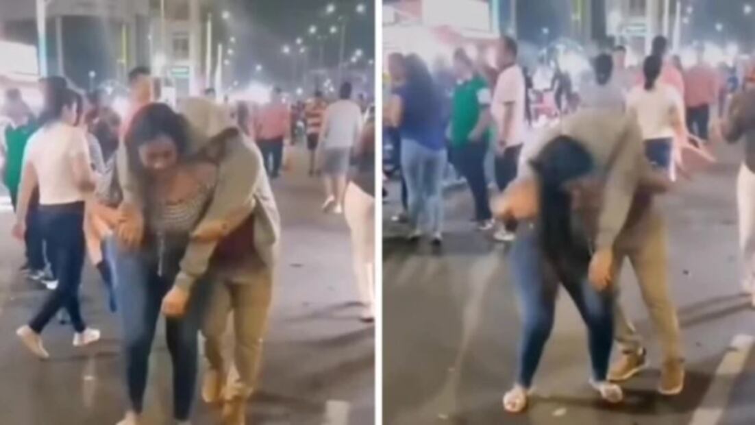 Mujer carga a su novio ebrio en su espalda y lo lleva a casa