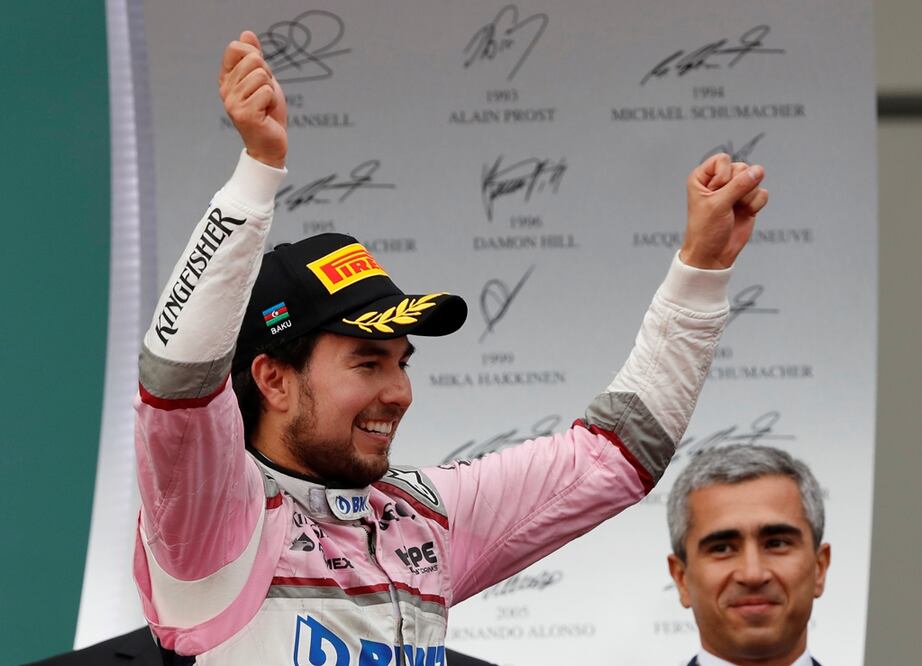 Sergio Perez celebrating on the podium after finishing third  - Photo: David Mdzinarishvili/ REUTERS