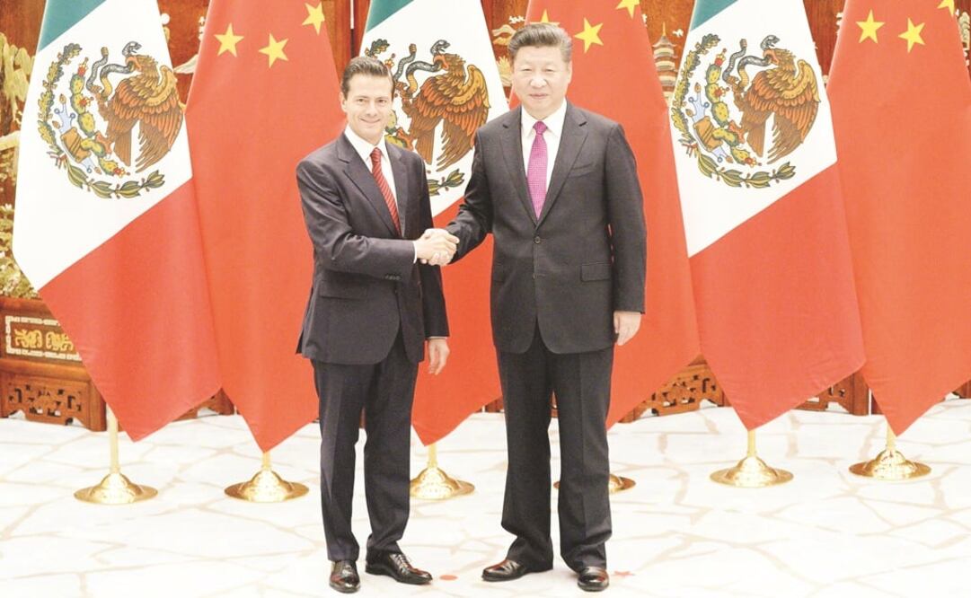 Los presidentes de México, Enrique Peña Nieto, y de China, Xi Jinping, durante una reunión en septiembre en el marco de la cumbre del G-20 en Hangzhou. (ARCHIVO. EFE)