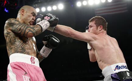 Alvarez takes middleweight title over Cotto