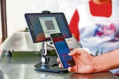 Van 6 bancos que adoptan DiMo para transferencias de dinero por celular