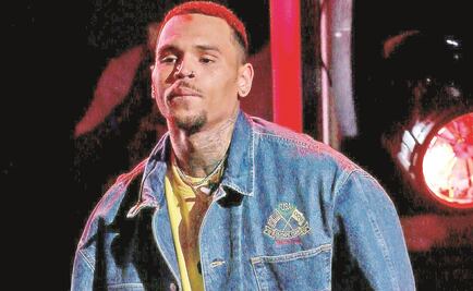 Arrestan a Brown por golpear a fotógrafo