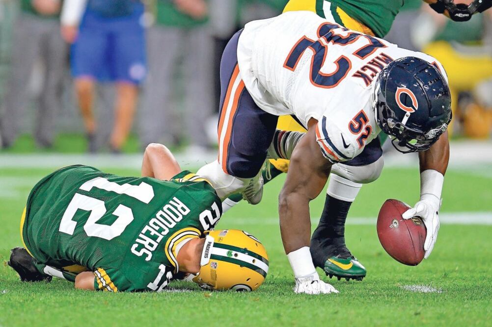 Se presume que habría sufrido esguince en la rodilla contra los Bears (STACY REVERE. AFP)